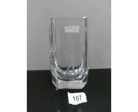 An etched Kosta nude glass vase.