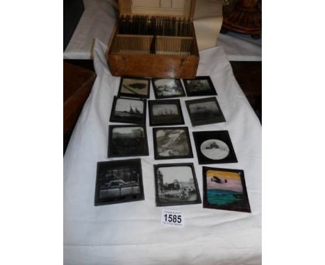 A pine collecting box and 37 magic lantern slides,