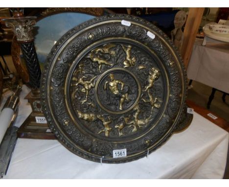 A heavy metal cast plaque.