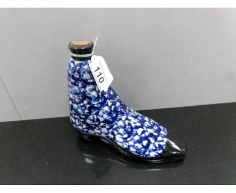 A Ceramic boot decanter.