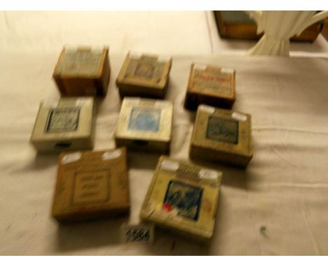 8 boxed sets of magic lantern slides being Little Muck, Robinson Crusoe, Cinderella, Wild Animals hunted, Reptiles, Comical c