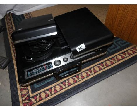 A compact Sanyo portable record player.