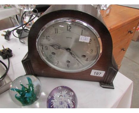 A Smith's mantel clock in working order.