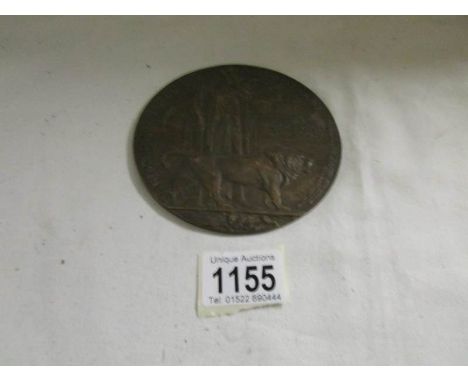 A WW1 memorial plaque dedicated to George Stanley Stainrod.