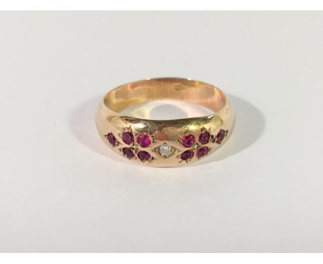 A diamond and ruby ring, Chester Hallmark, in 9ct rose gold, dated 1908.