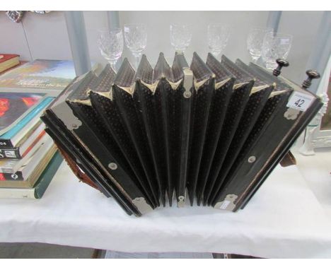 A Campbell's broad reed excelsior accordion.