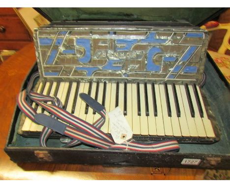 A Hohner 'Deco' accordion with case.  (case distressed).