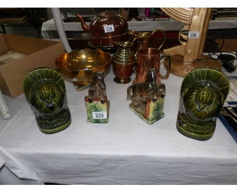 A pair of ceramic jumping horse bookends and a pair of bird bookends.