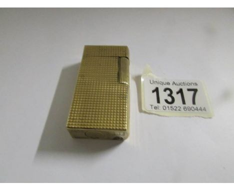 A Dunhill 70 cigarette lighter, BN924.