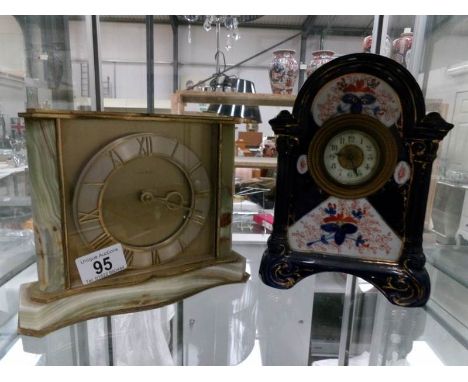 A ceramic clock and an onyx clock.