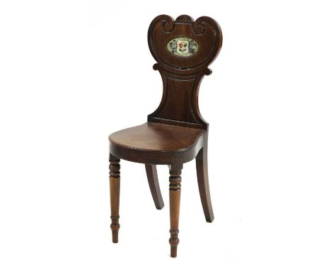 A Victorian mahogany hall chair, with painted oval flower panel 87cm high Provenance: The estate of Tony Venison.