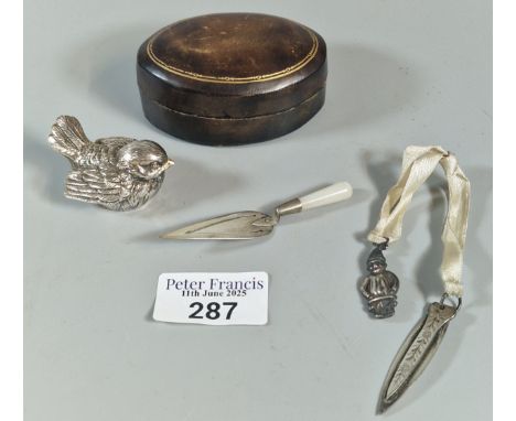 Oval box box comprising a study of a silver plated bird, together with a silver Chester hallmarked engraved bookmark with whi