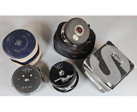 Hardy The St Aidan fly fishing reel in original case, together with a Garcia Mitchell 710 automatic fly reel and a System Two