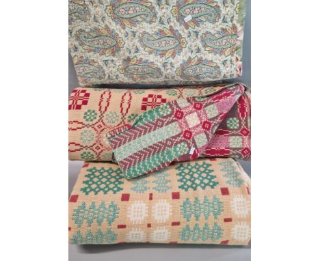 Two similar vintage peach ground geometric Welsh carthens (166x103 and 224x185cm approx.), together with a vintage floral pai
