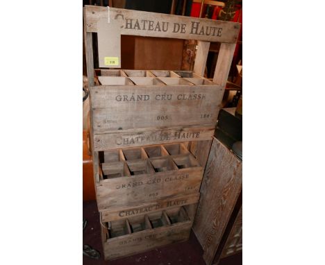 A set of three vintage style wooden wine crates of slatted construction, H.36cm W.47cm D.23cm (3) 