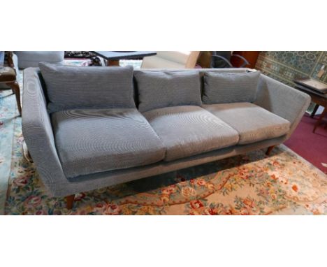 A contemporary Hayward three seater sofa by Designers Guild, upholstered in striped grey cord, H.70cm W.235cm D.85cm 