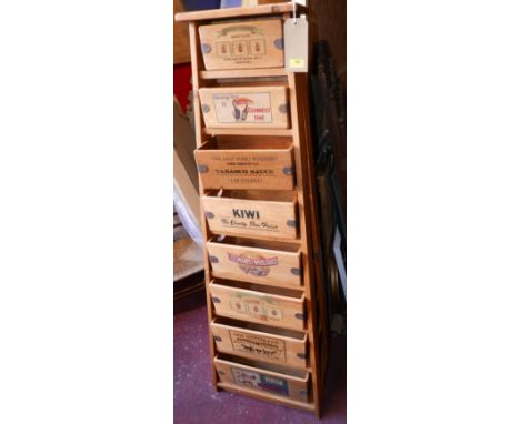 A vintage style graduated set of eight kitchen storage crates, H.155cm 