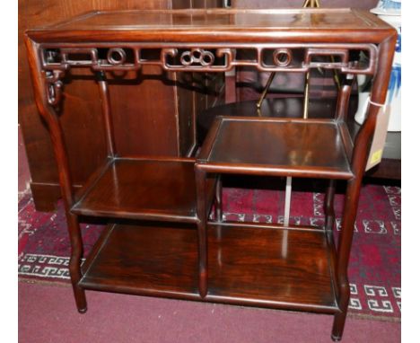 An early 20th century Chinese hardwood shelf unit with pierced frieze over an arrangement of three shelves, H.73cm W.68cm D.3