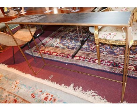 A contemporary gilt metal console table, with a slate style top, H.81cm W.119cm D.25cm 