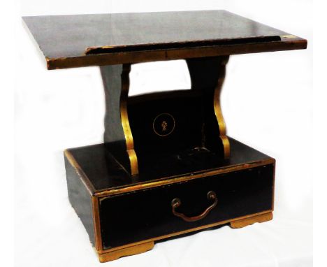 A 46cm Japanese Meiji period black lacquered and gilt lined Shinto pulpit with raised slope top and flanking shaped supports 