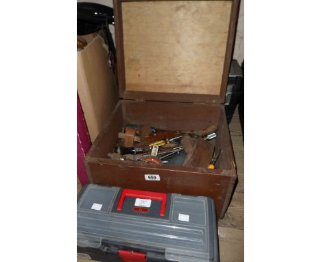 A wooden, two plastic and one metal toolboxes containing a large quantity of assorted tools including planes, scribes, screwd