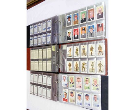 Three ring bound albums containing collections of sets and part sets of cigarette cards including numerous John Player exampl