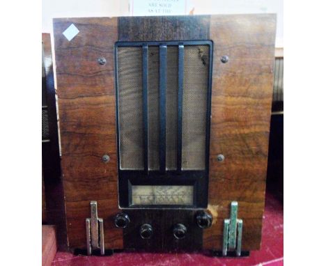 A 1930's Marconi Model 264A valve radio with contrasting veneer wooden case, Bakelite speaker fret and Art Deco chrome plated