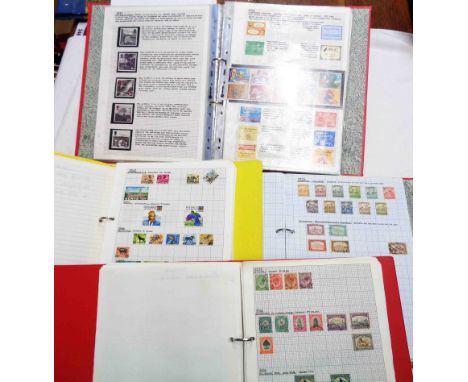 Four ring bound albums containing collections of hinge mounted 19th Century and later used and mint world stamps including on