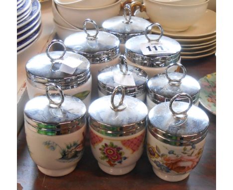 Nine Royal Worcester oven to tableware egg coddlers of various shape and pattern