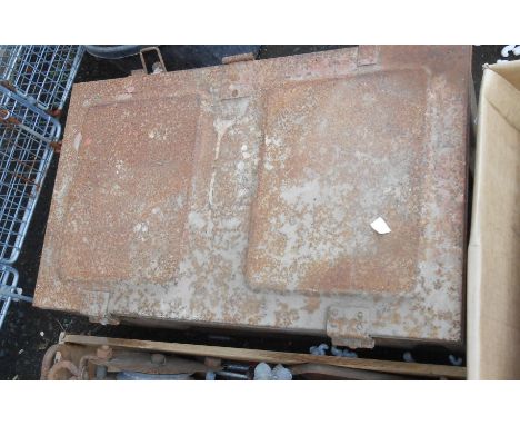 An old metal ammo box containing a quantity of assorted tools including planes, hand drills, etc.