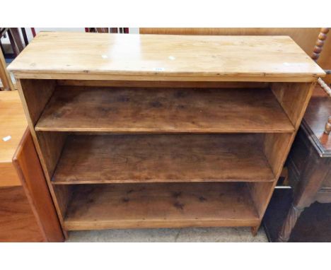 A 1.02m waxed pine three shelf open bookcase
