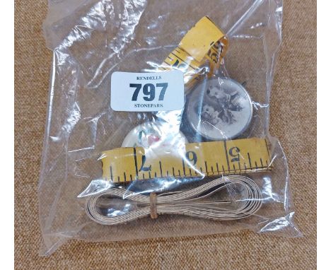 A bag containing a quantity of vintage tape measures including chrome plated example with portrait of George V and Queen Mary