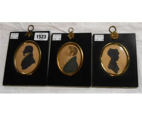 A 19th Century pencil, with watercolour highlighting, portrait miniature, set in an ebonised frame with gilt brass hanging ri
