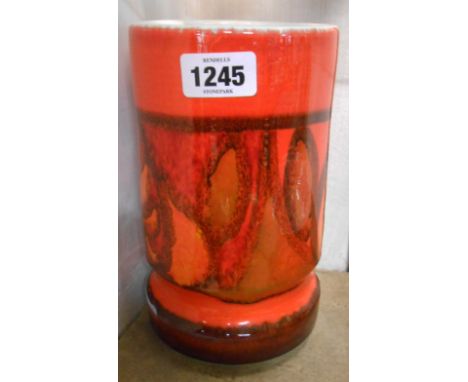 A vintage Poole Pottery Delphis vase of cylindrical form with orange, red and green abstract design