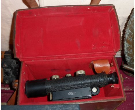 A vintage Hall Bros. surveyor's theodolite in original leather carrying case with matching wooden tripod