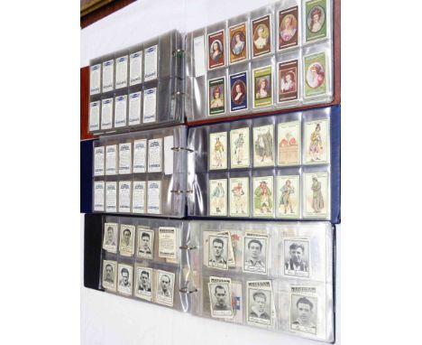 Three ring bound albums containing collections of sets and part sets of cigarette cards including numerous John Player exampl