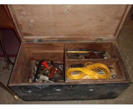 An old lift top box containing a quantity of assorted old tools