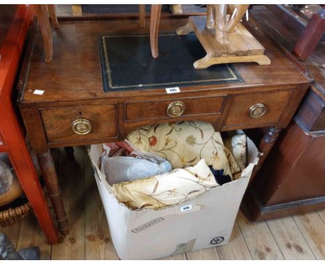 An 84cm late Georgian mahogany lowboy with later inset writing surface to top, and, three frieze drawers, set on ring turned 