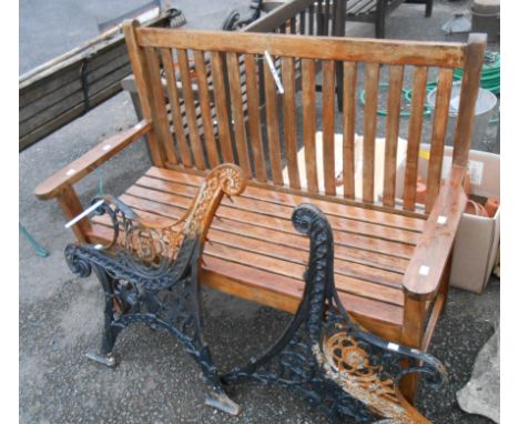 A wooden slatted garden bench