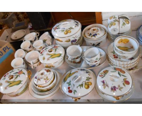 A quantity of Worcester Evesham oven to table ware including tureens, flan dishes, vegetable serving dishes, casseroles, rame