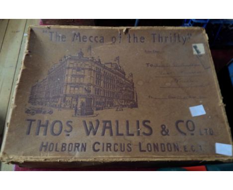 An old advertising box for Thos. Wallis &amp; Co. Ltd. 'The Mecca of the Thrifty' containing a quantity of embroidered panels