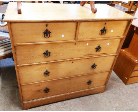 A 1.15m late Victorian ash chest of two short and three long graduated drawers, set on bracket base