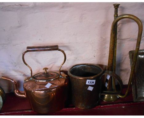 A Victorian copper kettle, an old brass bugle and an antique beaten copper measure