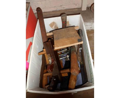A box containing a quantity of carpentry and other tools including planes, scribes, chisels, etc.
