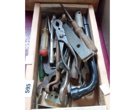 A small wooden box containing a quantity of assorted hand tools including spanners, pliers, etc.