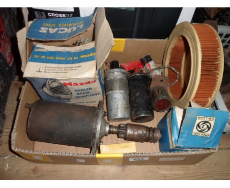 A box of vintage autojumble including Lucas headlamp, starter motor, etc.