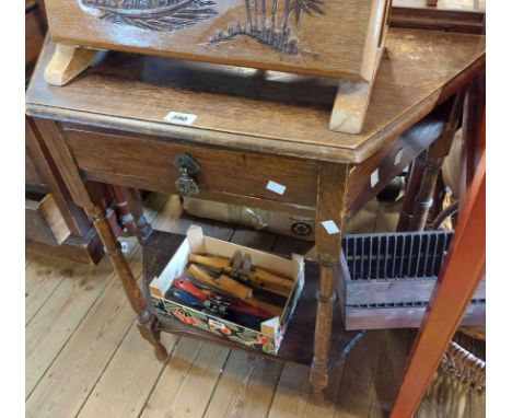 A 77cm old dark oak credence style hall table with drawer and slender ring turned supports