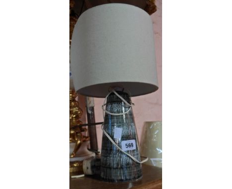 A vintage Rye Pottery table lamp of tapered form with hand painted scratch form decoration