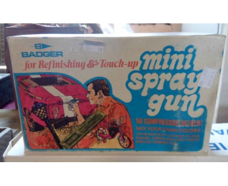A vintage boxed Badger mini spray gun