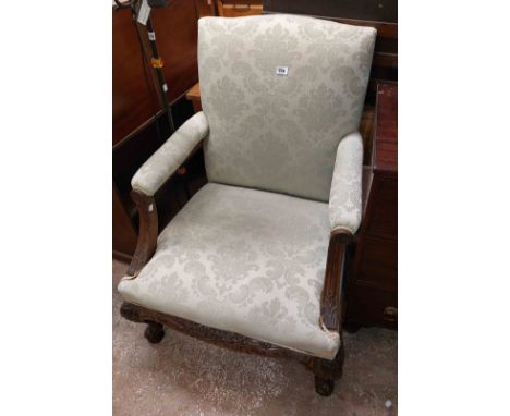 A late Victorian carved part show frame open armchair in the Georgian style with tapestry upholstery, set on cabriole legs wi